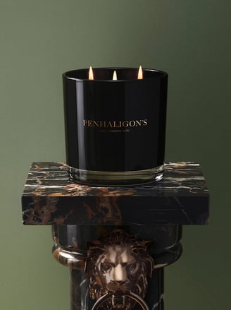 Maduro Leaf Candle on black marble stand