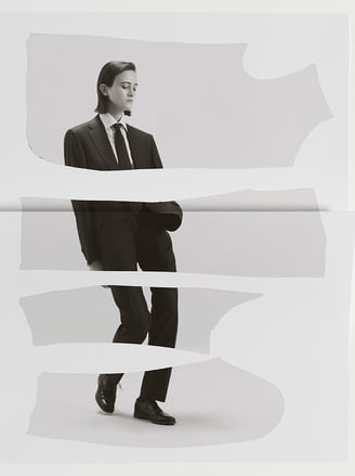 Woman posing in tailored suit