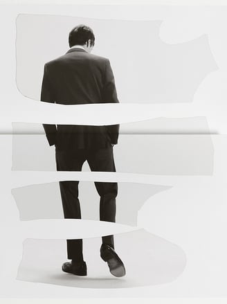 Man posing in tailored suit