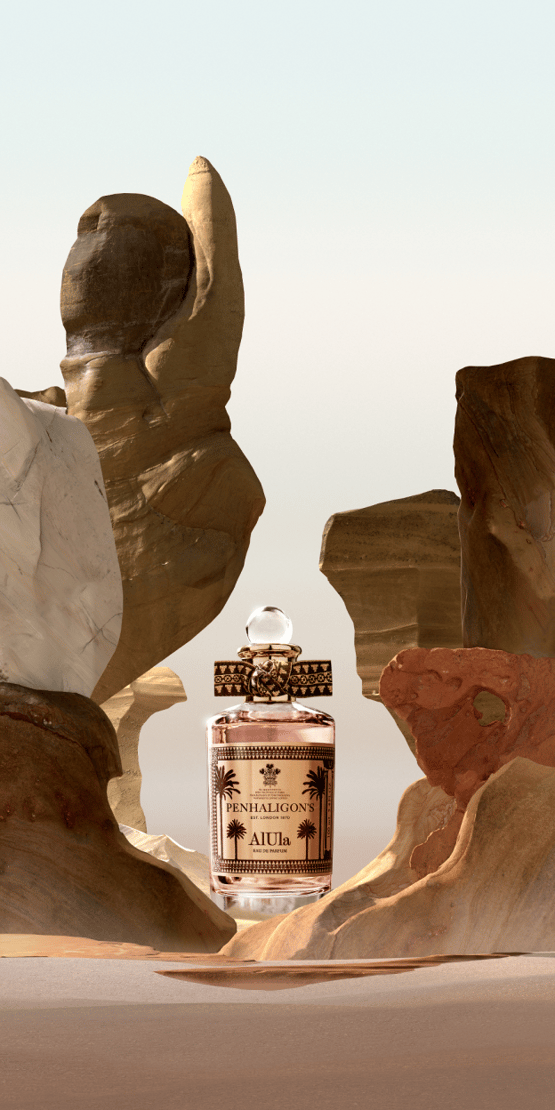 Alula fragrance bottle in desert