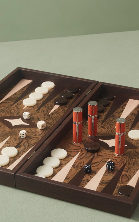 Penhaligons atomisers on backgammond game board