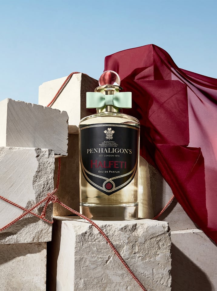 Halfeti on tower of stones and maroon red scarf